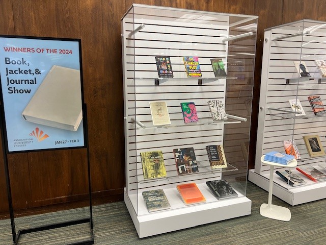 display of book, jacket and journal show