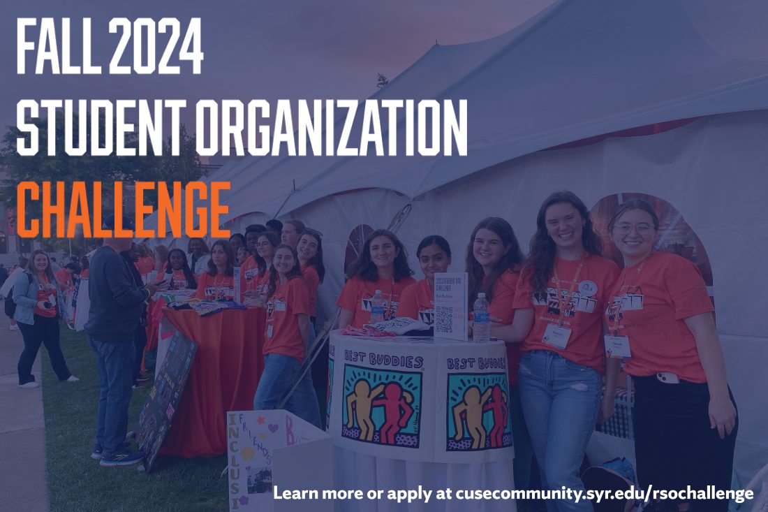 Students stand smiling in the quad during the Student Organization Challenge