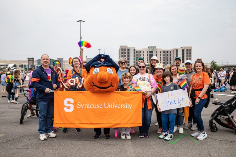 Members of the Syracuse University community and Otto the Orange marching in the CNY Pride parade on June 10, 2023. (Photo by Randy Pellis)