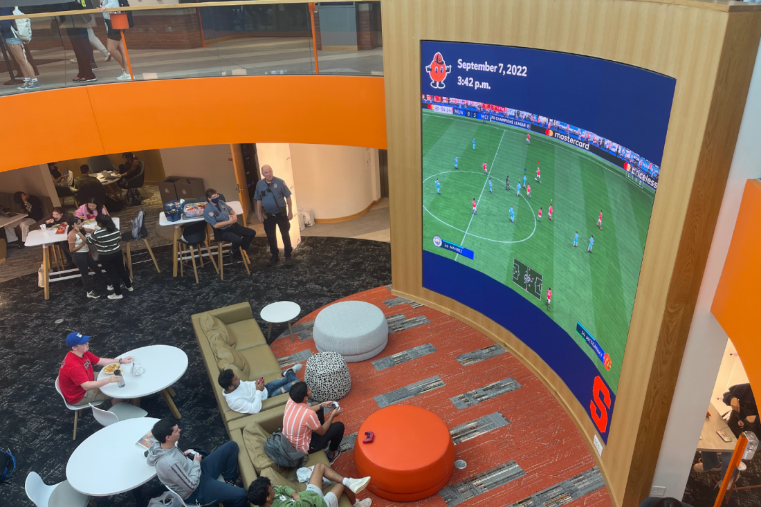 Students and DPS playing during Game Night in Schine Student Center