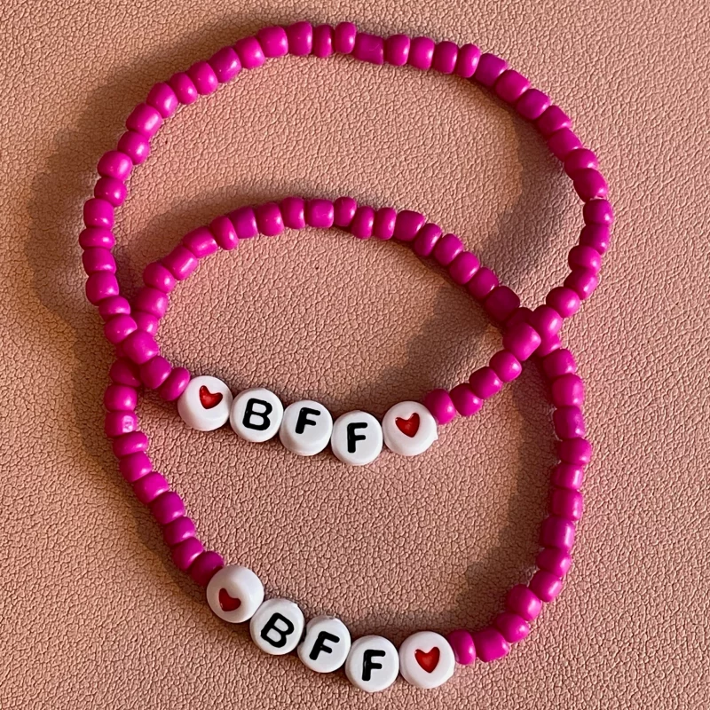 pink beaded bracelets with a heart bead and BFF spelled out