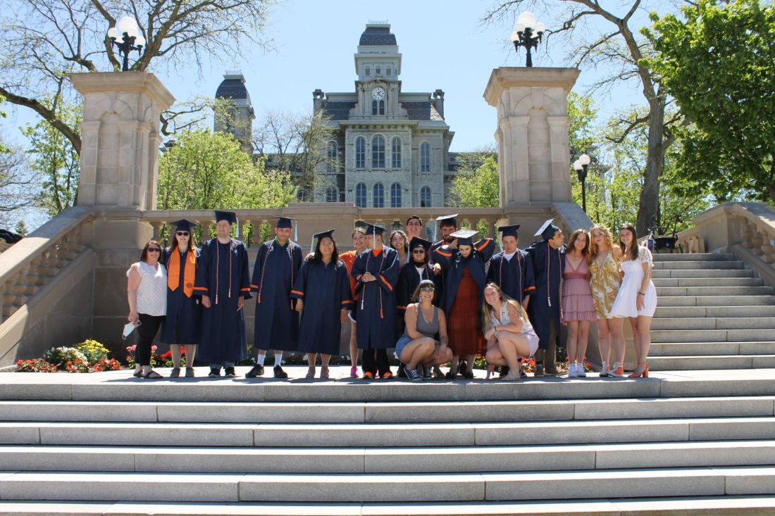 students with graduation caps and gowns