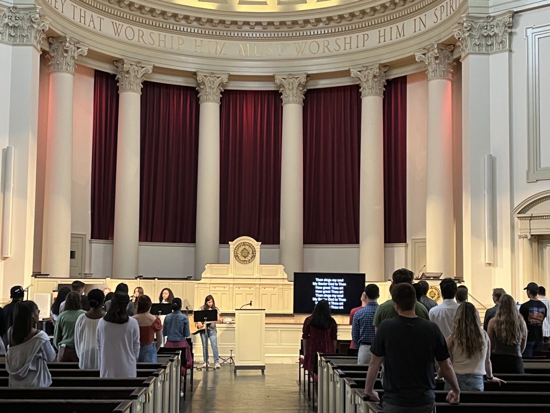 Students stand in worship in Hendricks Chapel.