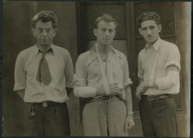 group photo of three men workers