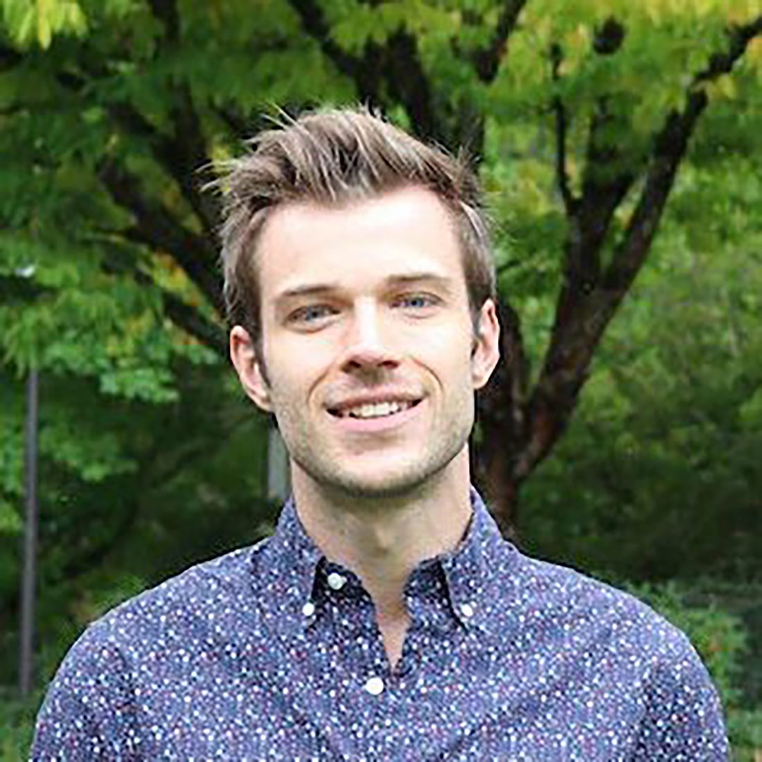 Portrait of Professor Joe Wilson standing outside. 