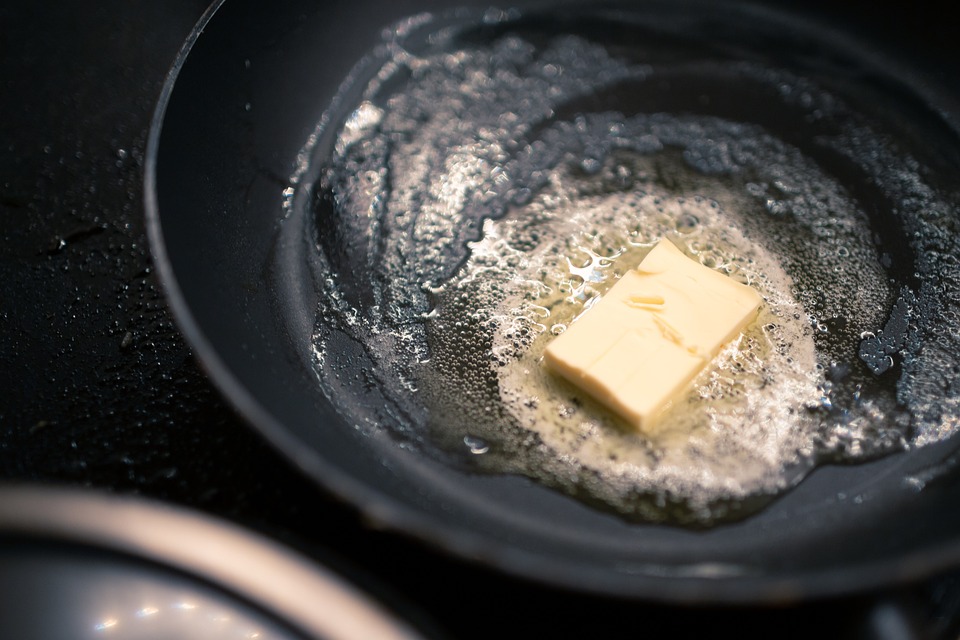 butter sizzling in pan