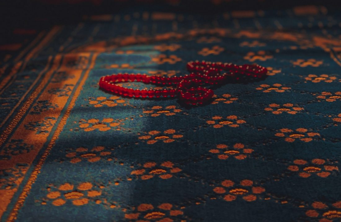 Muslim Prayer Rug and Beads