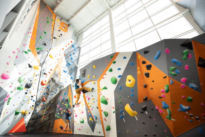 Two-story rock climbing wall and bouldering area in the Barnes Center