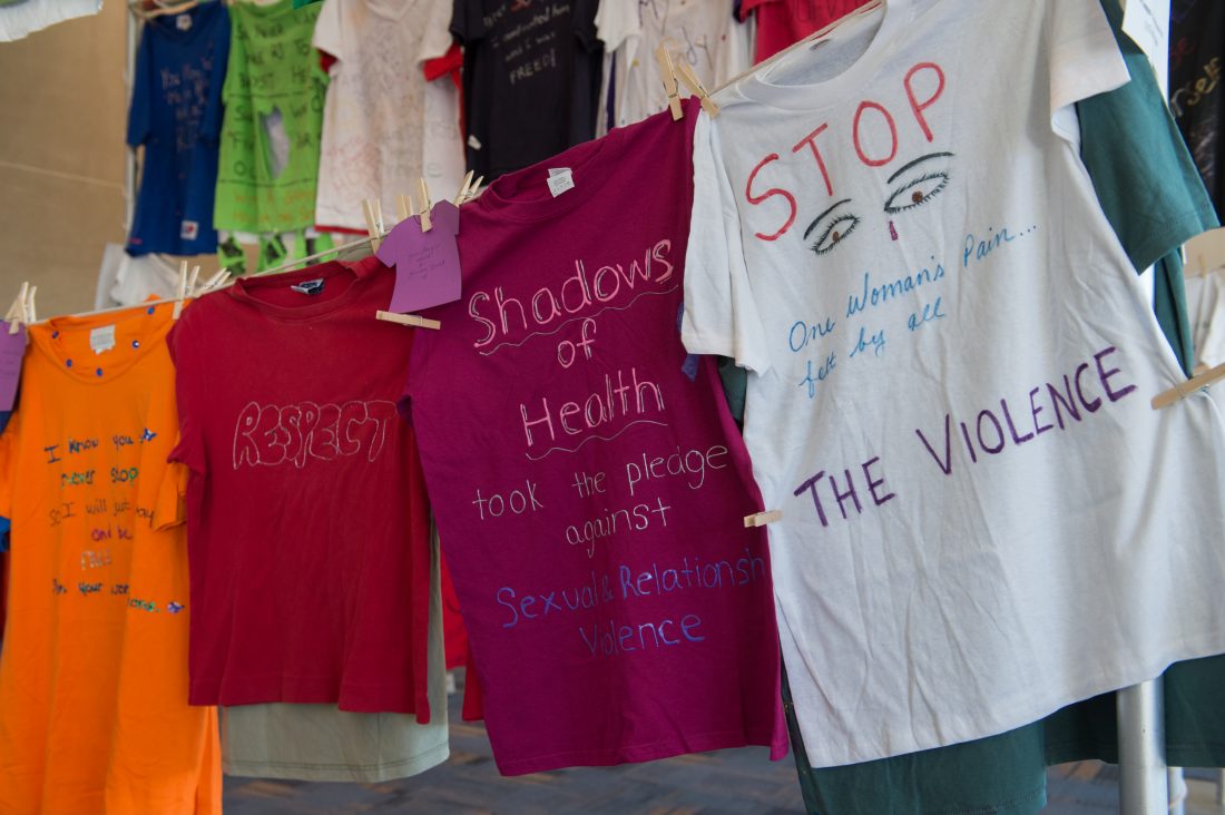 T shirts decorated by people impacted by interpersonal violence displayed in the Clothesline Project.