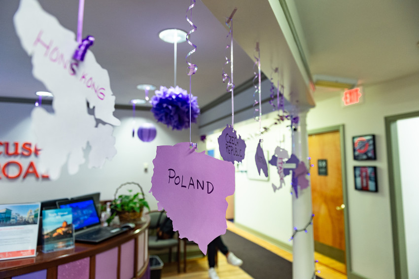 The Syracuse Abroad Office with purple decorations in solidarity with Domestic Violence Awareness Month.