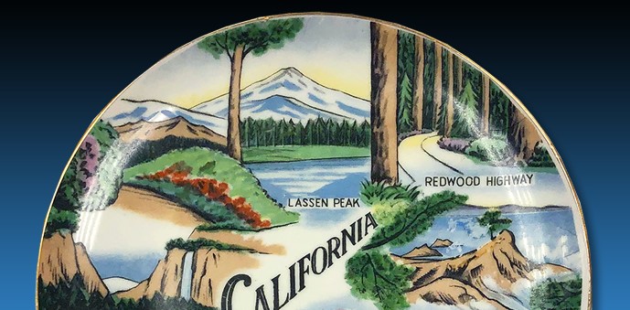 plate with pictures of California icons, including Lassen Peak and Redwood Highway