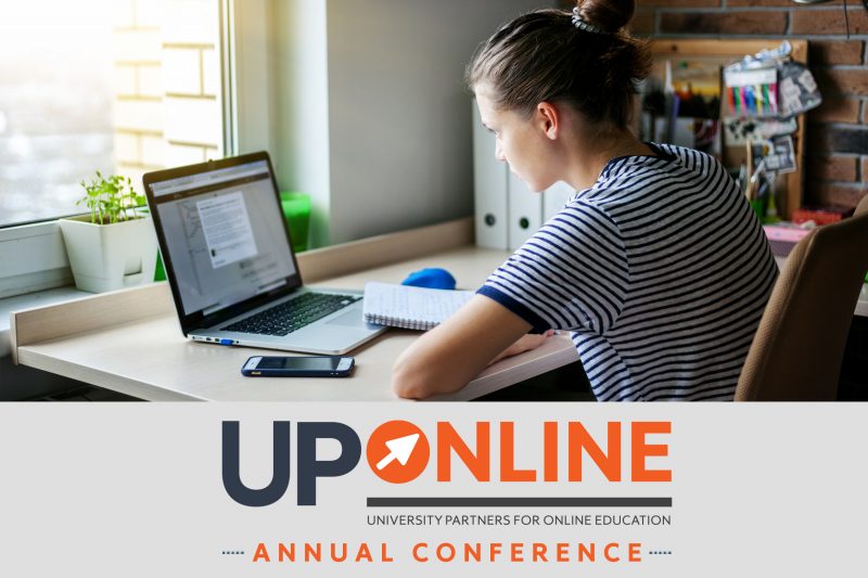 Girl sitting at desk with laptop with UP Online logo overlay