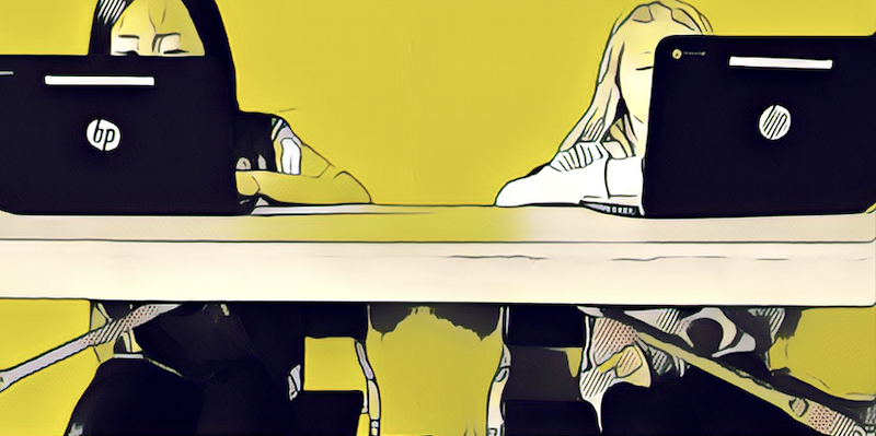 cartoon style illustration of two young girls on laptops at a classroom table