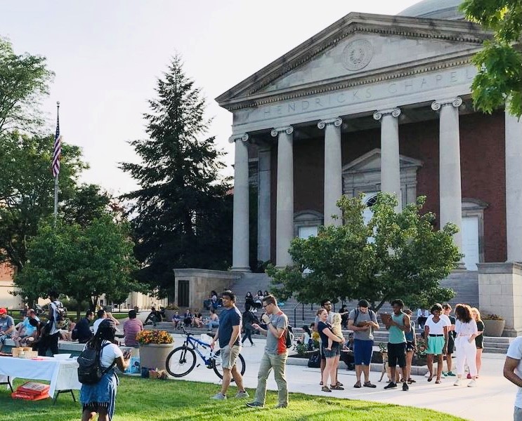 Students gather for Campus Church outside of Hendricks Chapel.