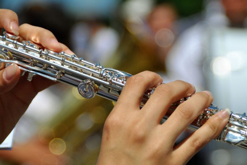 A student plays the flute.