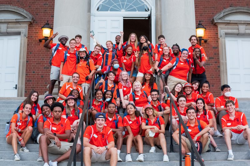 group of orientation leaders in orange polos