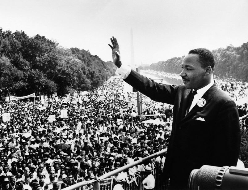 Rev. Dr. Martin Luther King Jr. in front of a crowd