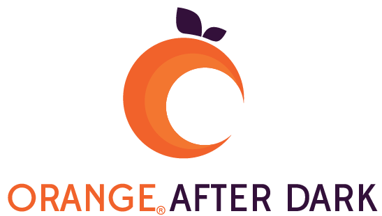 The Orange After Dark Logo— a crescent moon shaped orange above the text 