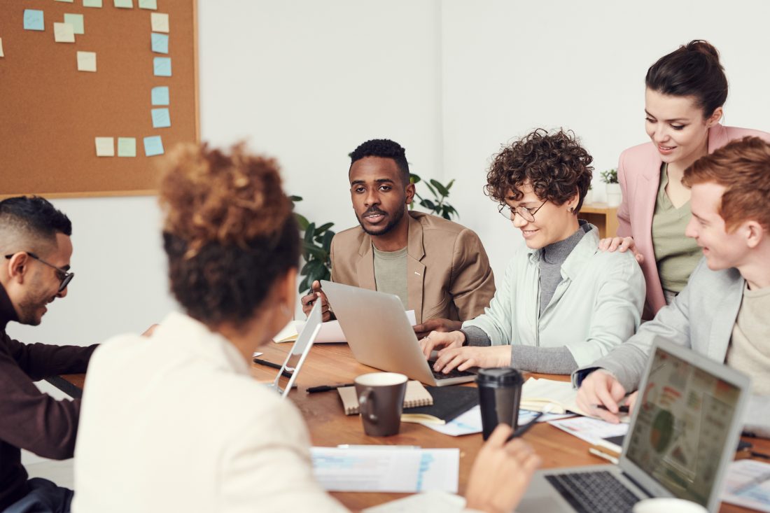 Diverse group of friends in a meeting.