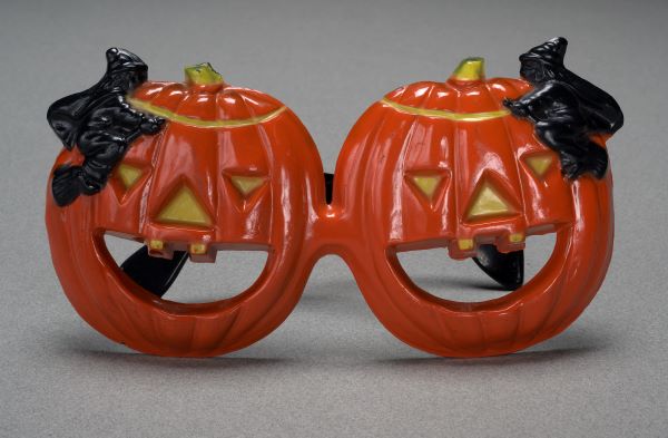 plastics glasses shaped like two jack-o-lanterns