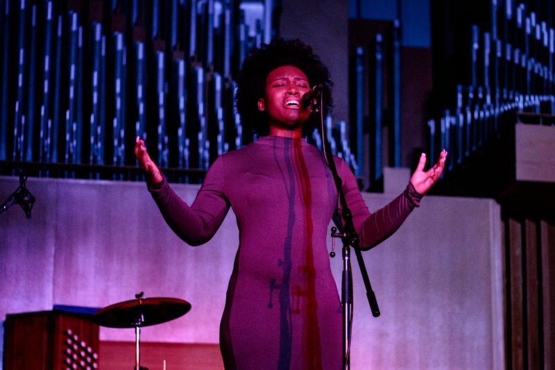 A student performs onstage during a Prism Concert.