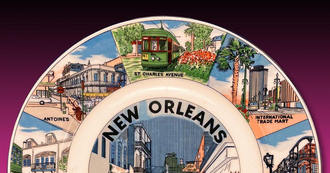 Louisiana state plate with image and word New Orleans in center